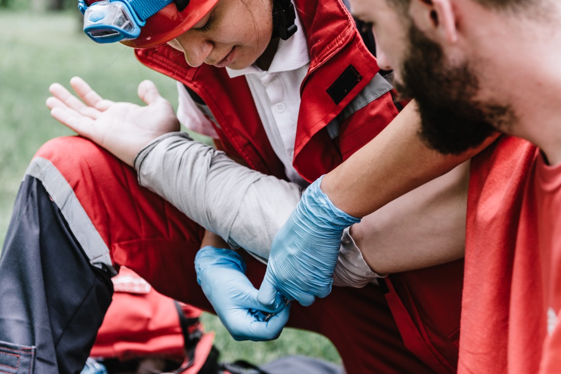 First aid paramedic in training, treating third degree burns